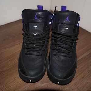 Jordan 12 in Black with Purple Highlights